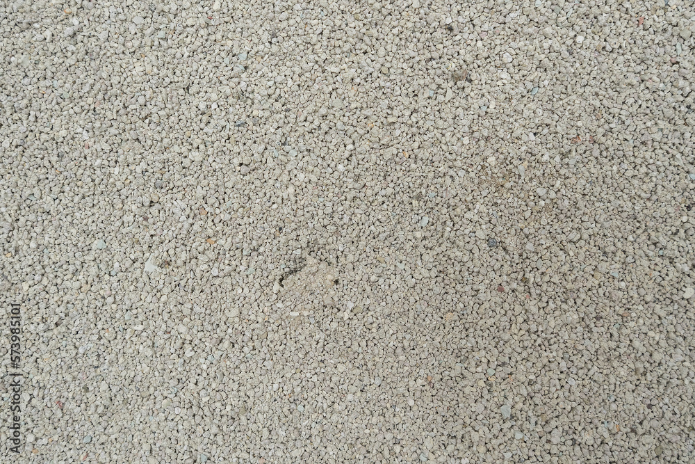 Background of domestic animal toilet gravel for urine absorbing. Abstract pattern of sand in animal toilet box. Background of domestic animal toilet gravel for urine absorbing. Abstract pattern of sand in animal toilet box.