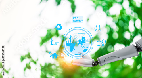 Robot arm holding earth on green tree background,Environment concept, Artificial Intelligence and Technology ecology concept,Clean energy