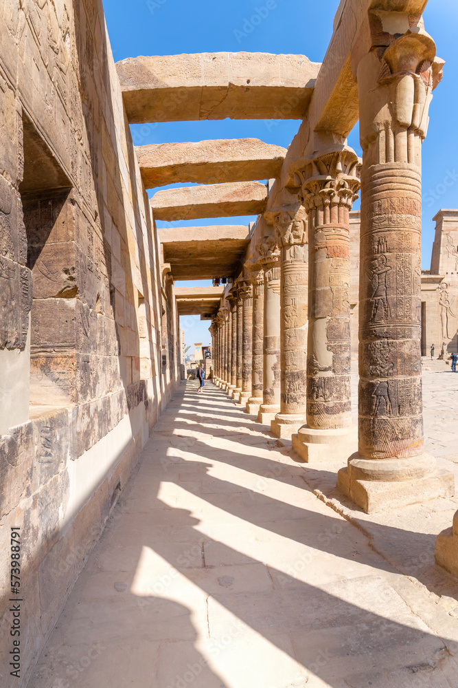 Aswan, Egypt; February 14, 2023 - A row of columns at the Temple of Philae, Aswan, Egypt.