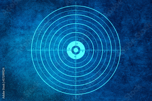 Target sign on blue abstract background. Business goal concept.