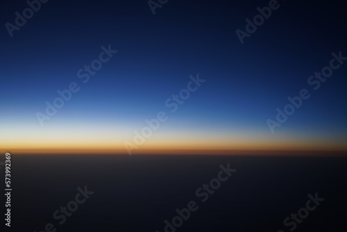 Sunrise shot from the aircraft window.