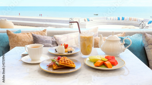 Beachfront hotel breakfast, beautiful morning on beach