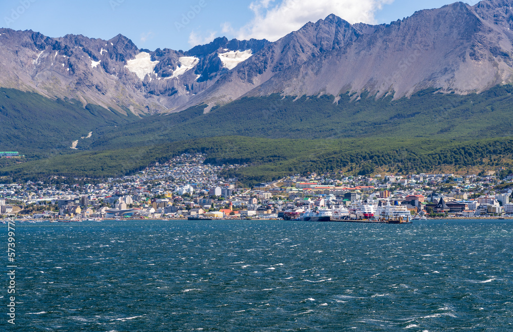 Panorama of the city of Ushuaia in Patagonia Argentina under the mountains showing port