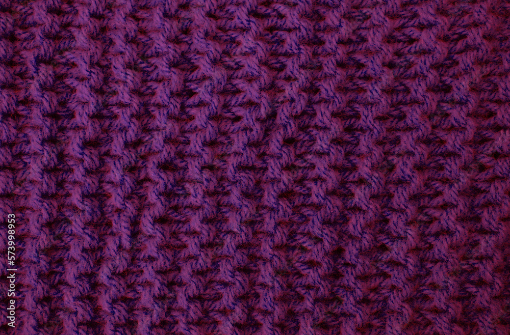 The surface is knitted with woolen threads.