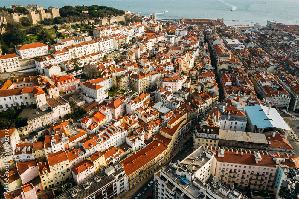 Aerial drone view of St. George Castle in Lisbon, Portugal with surrounding cityscape