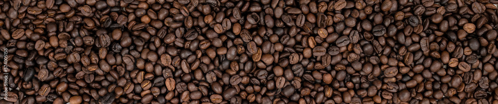 Fresh roasted brown coffee beans panoramic background Fresh roasted brown coffee beans panoramic background