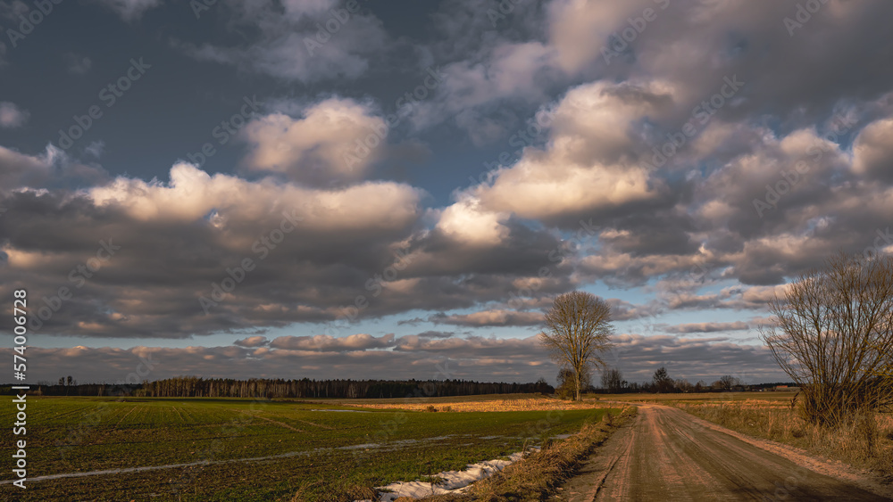 Billowing clouds over the fields of the polish countryside. Billowing clouds over the fields of the polish countryside.