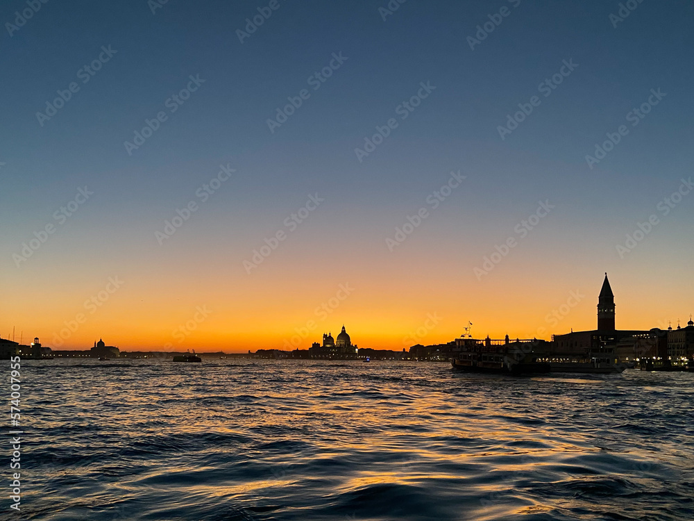 water surface of Venetian lagoon in Venice city at sunset
