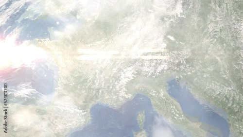 Earth zoom in from outer space to city. Zooming on Vevey, Switzerland. The animation continues by zoom out through clouds and atmosphere into space. Images from NASA