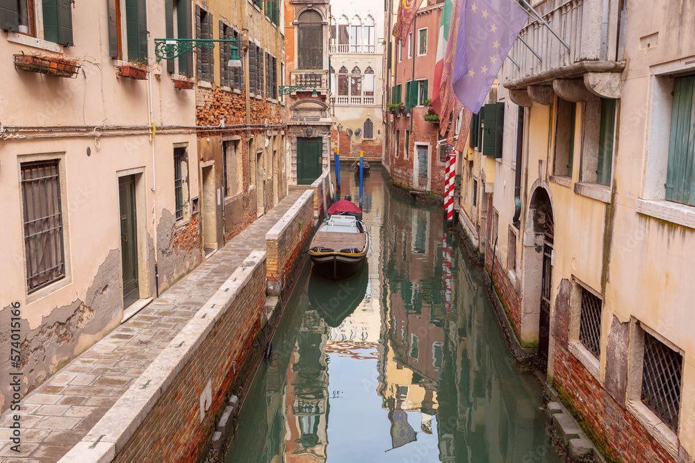View of old traditional Venetian houses along the canal.
