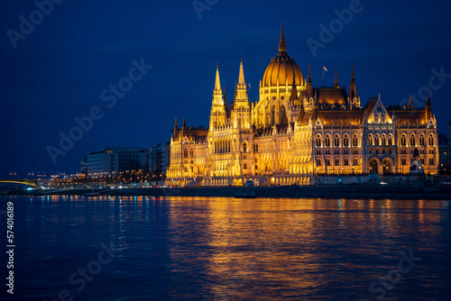 Hungarian Parliament building and Margit Hid, Margaret Bridge. Beautiful night-time view with reflection in Danube river, Budapest, Hungary. © salarko