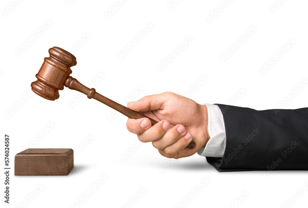 Male hand with wooden judge hammer on background Male hand with wooden judge hammer on background