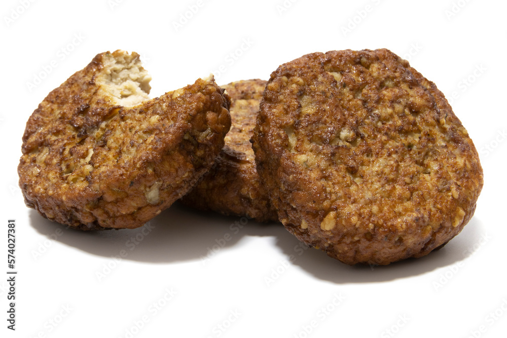 Frikadellen (squashed meatballs) isolated on a white background. German food concept.