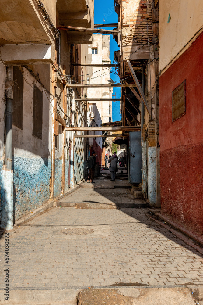 Fototapeta premium Beautiful view of street with typical arabic architecture in Fez. Location: Fez, North Morocco, Africa. Artistic picture. Beauty world