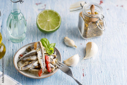 anchovy appetizer with olives.