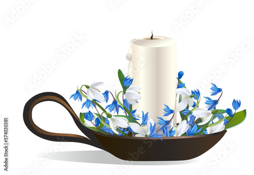 Decorative paraffin candle in a candlestick with blue and white flowers, an element of festive and wedding celebrations