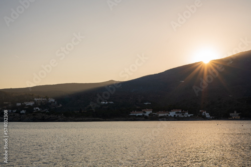 Cadaques, Spain. February 2023. Enjoy a stunning sunset in Cadaques, where the warm tones of the sun blend with the cool hues of the sea, creating a spectacular visual contrast on the coastal horizon.