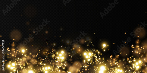 Christmas background. Powder gold dust PNG. Magic shining gold dust. Fine, shiny dust bokeh particles fall off slightly. Fantastic shimmer effect.	