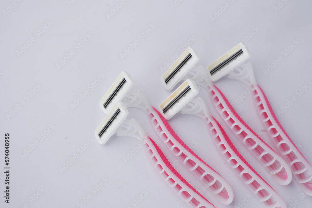 close up of pink color razor on table ,