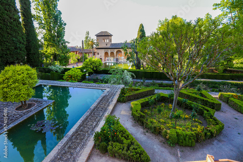 Part of Alhambra with old buildings ( memorial of Moorish art) photo