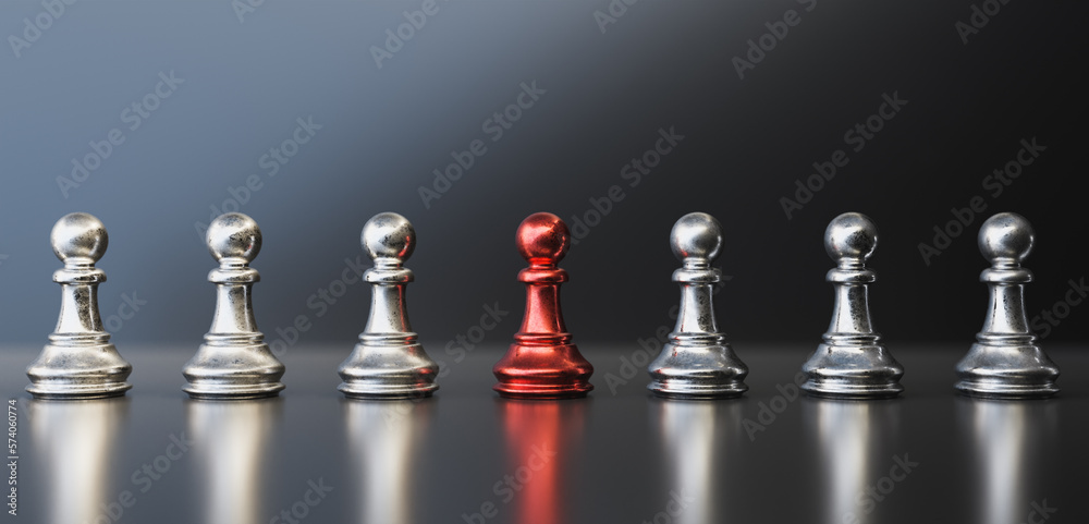 Leadership concept, red pawn of chess, standing out from the crowd of silver pawns. 3D Rendering Leadership concept, red pawn of chess, standing out from the crowd of silver pawns. 3D Rendering