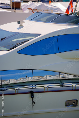 Closeup of a side of a luxury yacht at the boat show Miami © Felix Mizioznikov