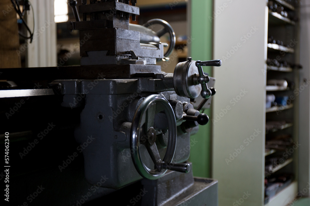 Fototapeta premium A handle that turns an axis on a lathe 