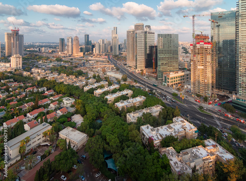 Tel Aviv aerial view. Green dormitory quaters and modern skyscrapers photo
