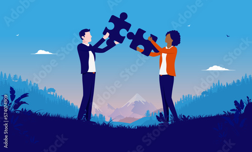 Business solving problem - Two businesspeople, man and woman putting puzzle pieces together. Finding solutions via teamwork concept, flat design vector illustration