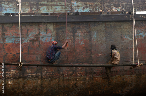 workers on the wall