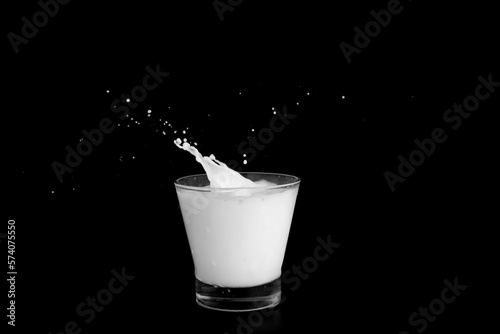 Splashes of milk on a black background