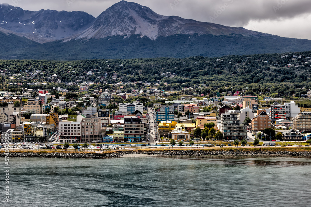 Ushuaia, Argentina - December 28, 2022: The city skylines on the mountain slopes of Ushuaia, Argentina with the port visible in the background
