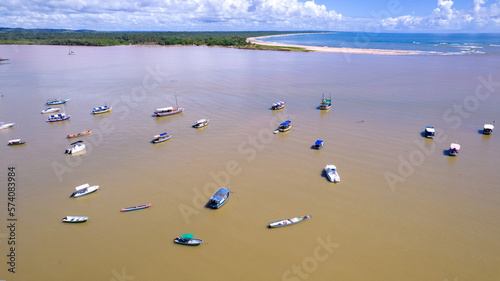 Aerial view of Itacare beach, Bahia, Brazil. Village with fishing boats and vegetation