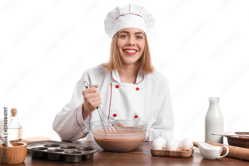 Female baker making dough at table on white background Female baker making dough at table on white background