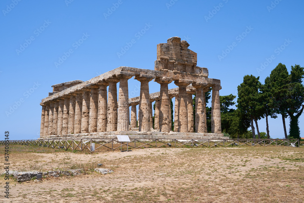 Side view on the Athena Temple from the Unesco World Heritage Site in Paestum. The facility is located in the Campania region of Italy. Ancient Greek culture in southern Italy.