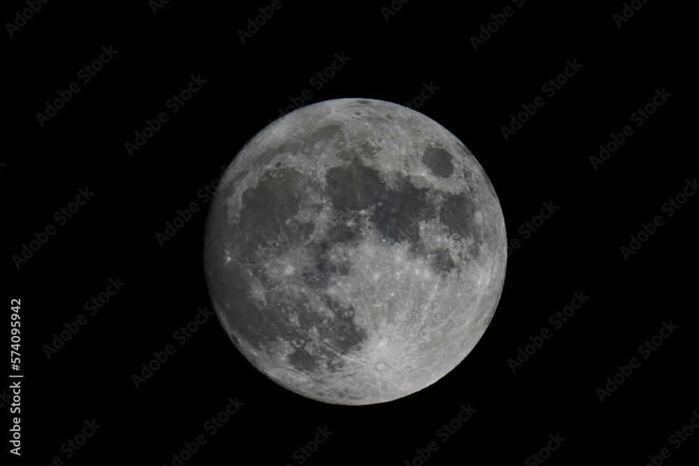 Fototapeta premium The full moon against dark night sky