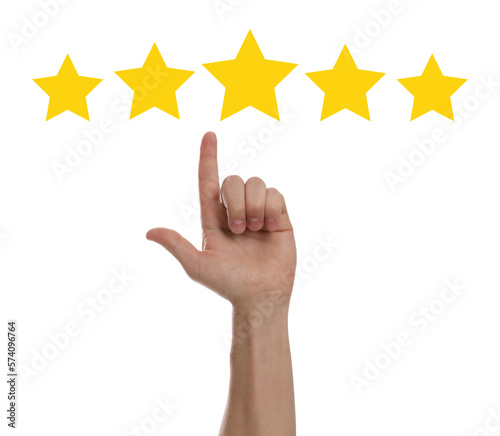 Quality evaluation. Man pointing at golden star on white background, closeup