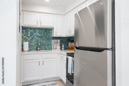Green tiled small kitchen in vacation rental, Cape Canaveral, Florida