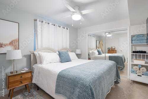 Pale blue bedroom decor in vacation rental, Cape Canaveral, Florida photo