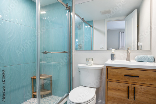 Bathroom with blue tile shower in vacation rental  Cape Canaveral  Florida