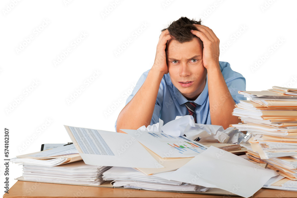 Tired young businessman with many business papers Tired young businessman with many business papers