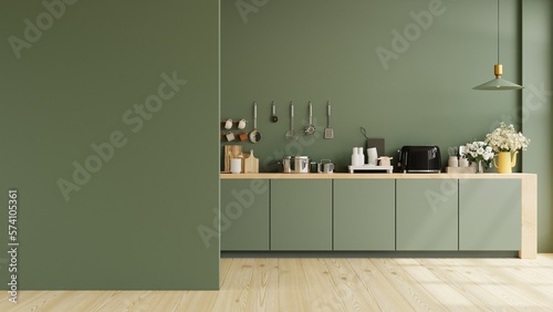 Green kitchen and minimalist interior design. photo