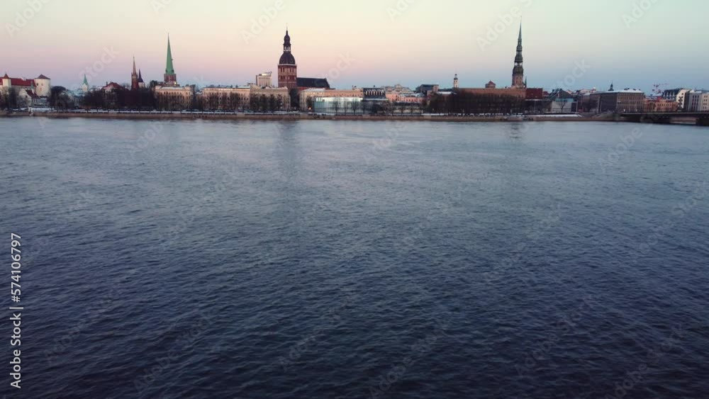 Daugava river water surface and Riga city skyline, aerial view Daugava river water surface and Riga city skyline, aerial view