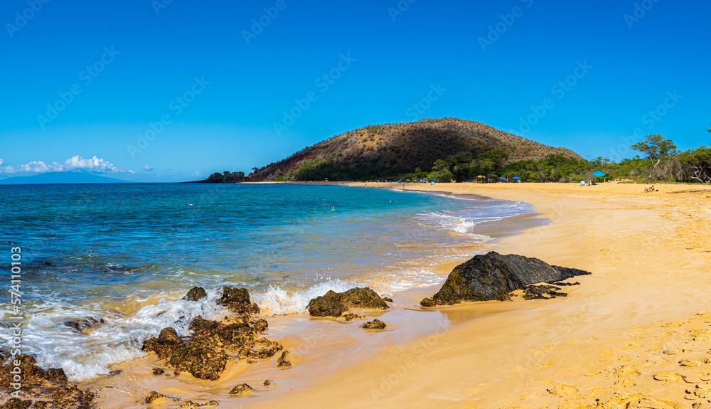 Tourists Enjoying The Sand Covered Shore of Big Beach, Makena Beach State Park, Maui, Hawaii, USA