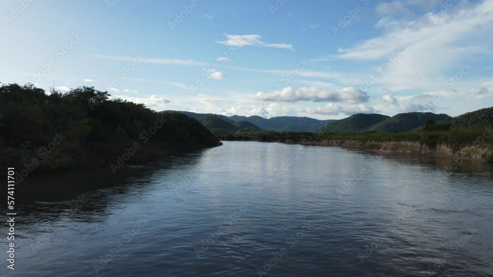 Boat Sailing in River Waters, Front POV of Pristine Landscape of Rural South America Boat Sailing in River Waters, Front POV of Pristine Landscape of Rural South America