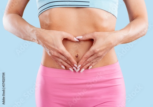 Healthy stomach, woman hands on belly