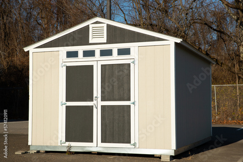 gray new shed a shed is typically a simple, single-story roofed structure in backyard © Victor
