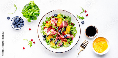 Print op canvas Gourmet salad with smoked duck, oranges, blueberries, cranberries, arugula and l