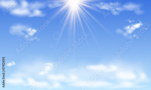 A blue abstract background in the Blue Sky with Sun Rays and Clouds.