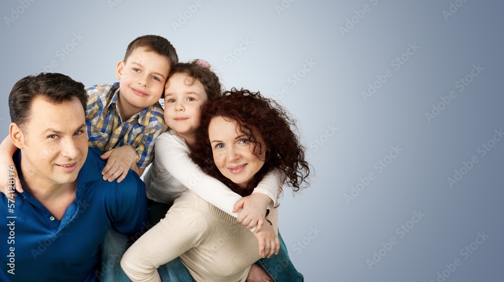 Happy young family with child posing